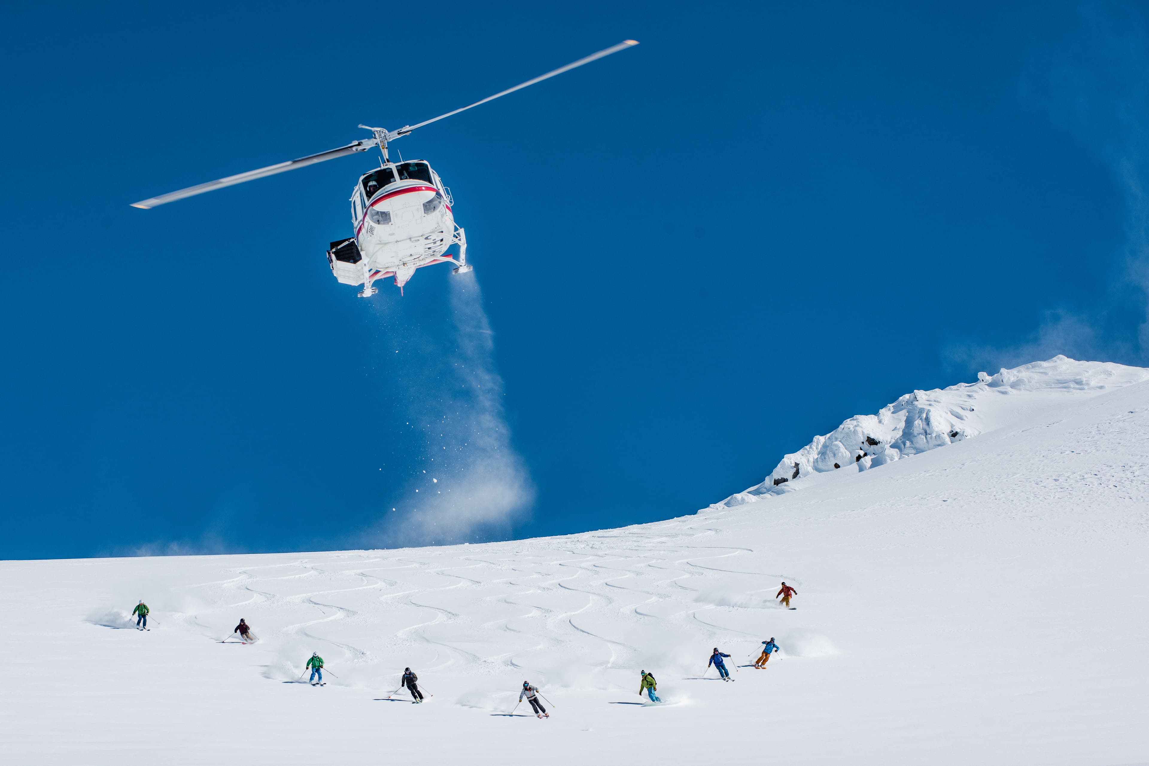 The Ultimate Mountain Adventure: Six Days of Heli-Skiing, with Lodge Stay, Meals, and Airfare Included